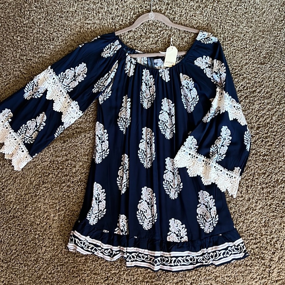 Small Dress by Jodifl in a print with lace.
